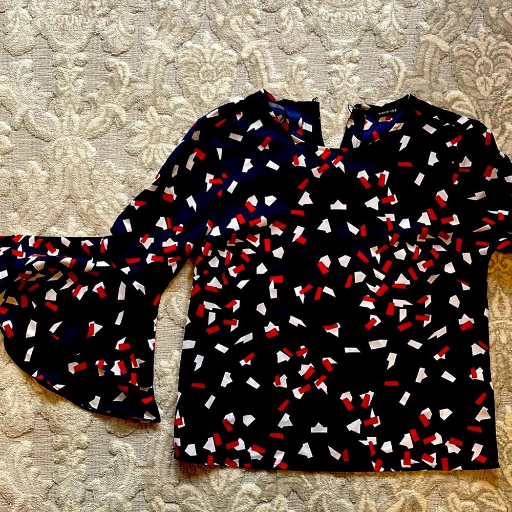 Red white and blue blouse